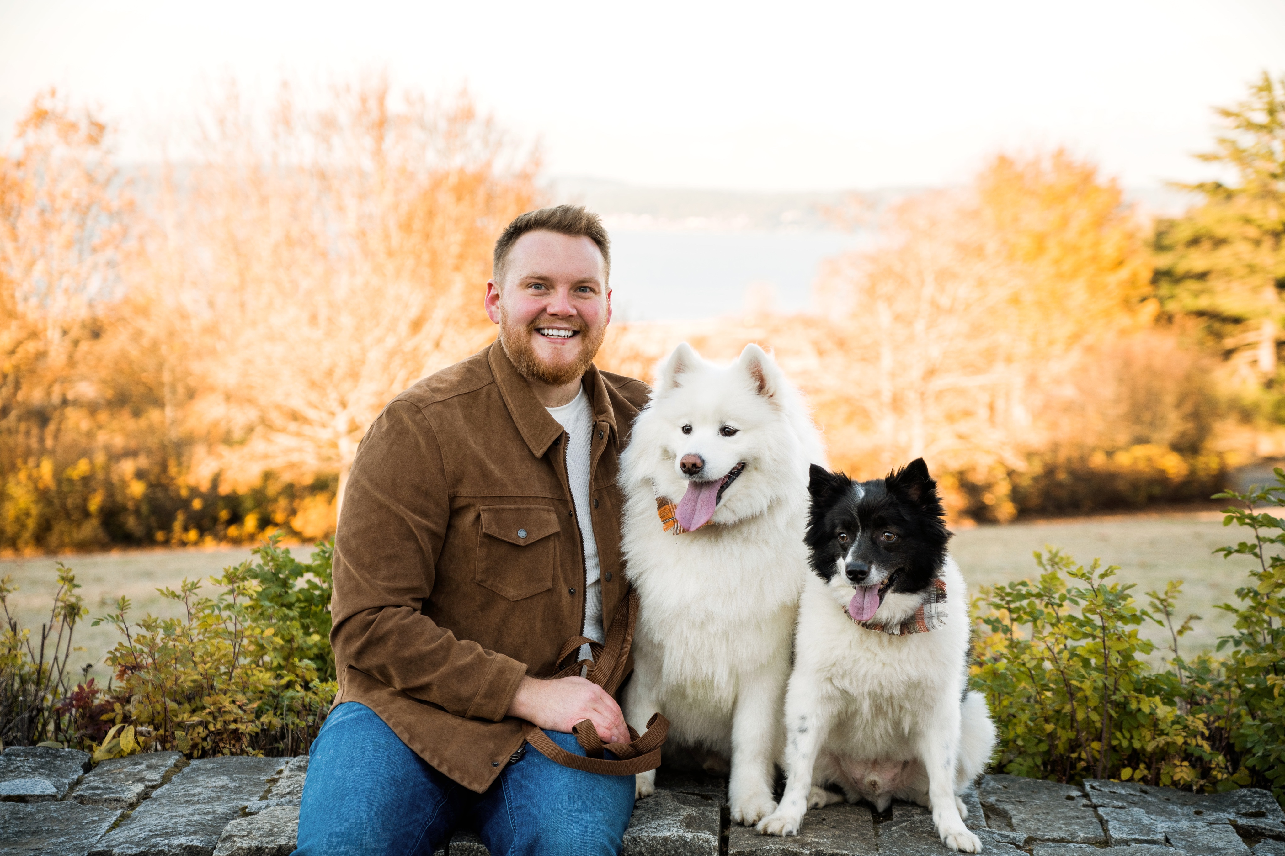John Judge with Apollo and Finn outdoors